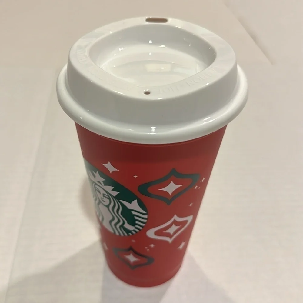 NWOT Starbucks 2023 reusable cup with red green & white colors good for refills